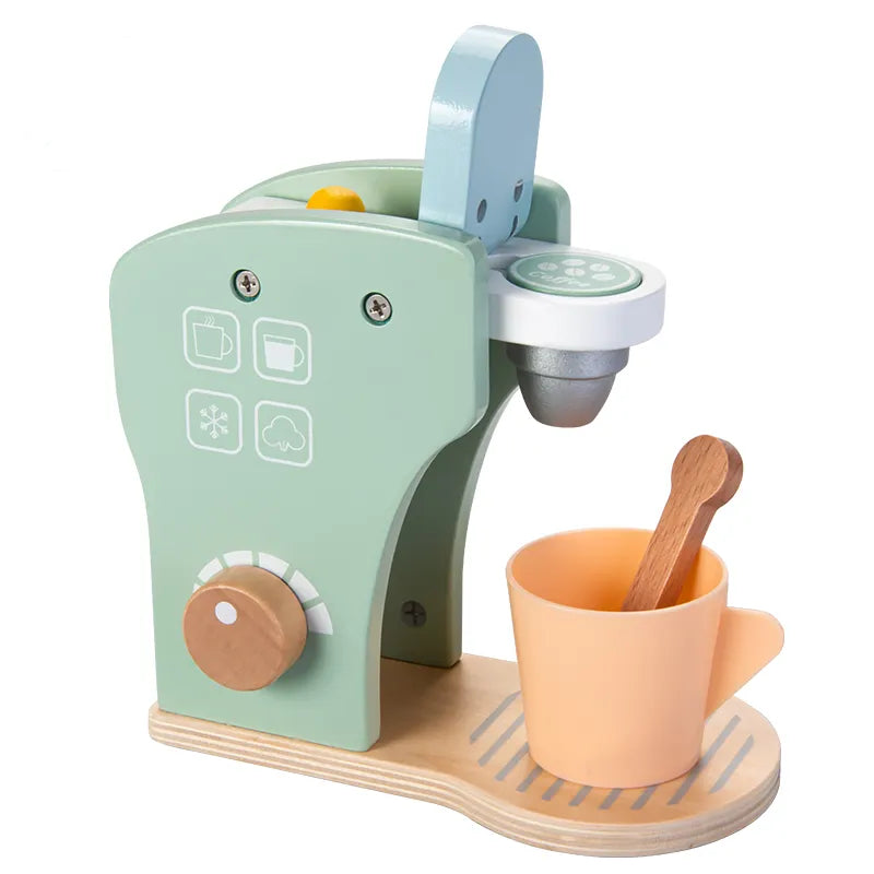 A wooden coffee maker toy set in pastel colors, including a cup, spoon, milk carton, and coffee pods.