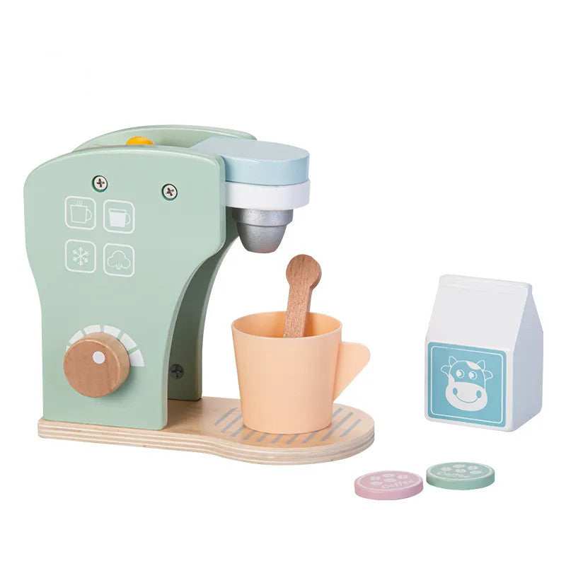 A wooden coffee maker toy set in pastel colors, including a cup, spoon, milk carton, and coffee pods.