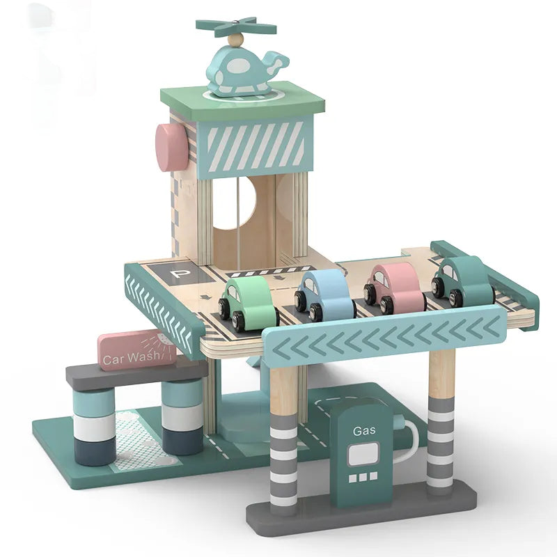 A wooden playset featuring a parking garage with elevators and a ramp, gas station with vehicles, and a repair shop.