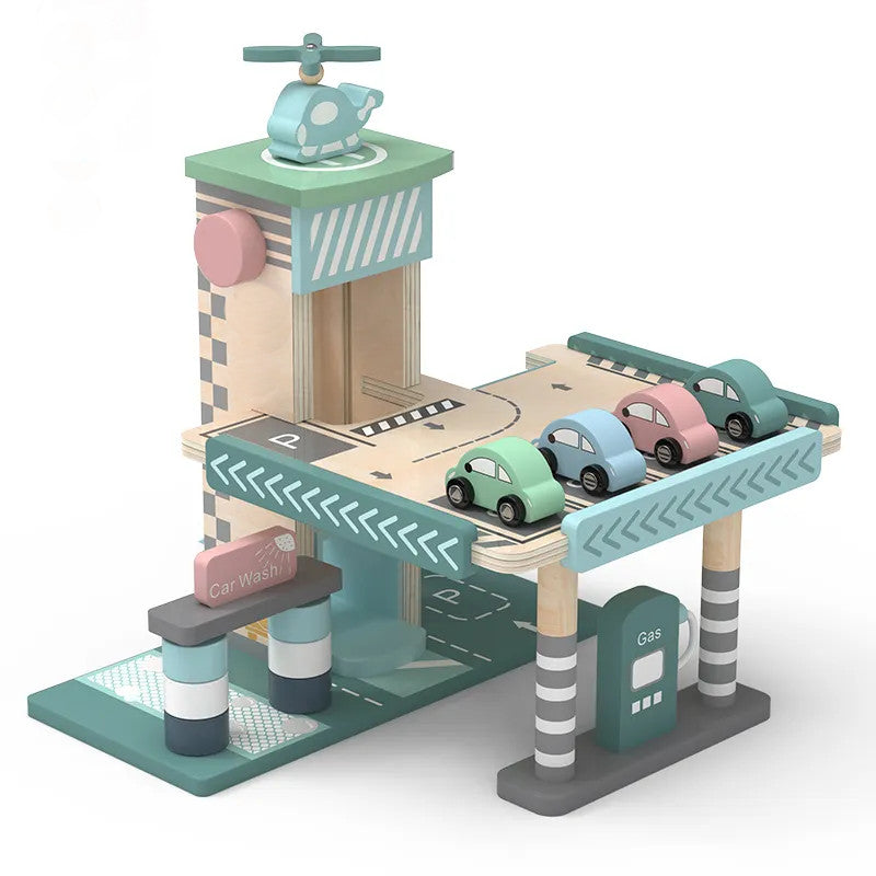 A wooden playset featuring a parking garage with elevators and a ramp, gas station with vehicles, and a repair shop.